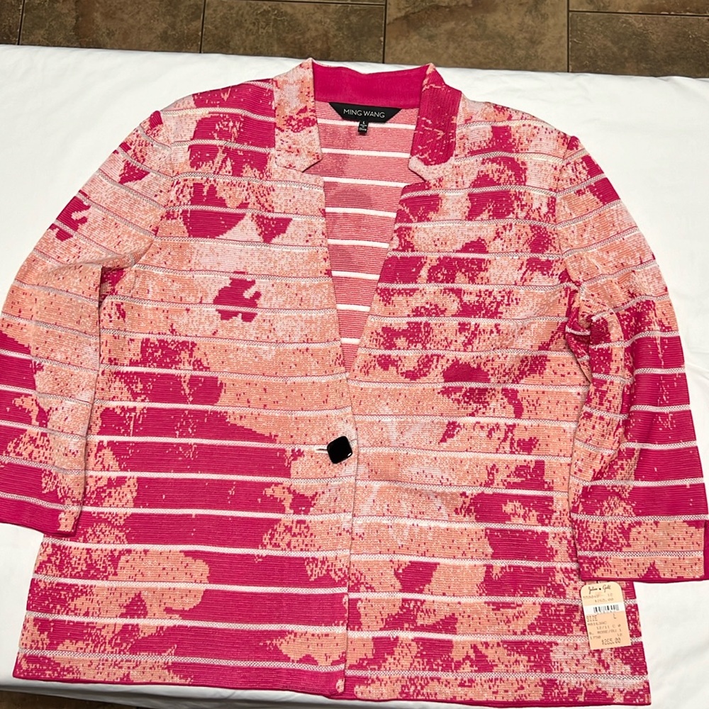 Pink and Cream women’s jacket.